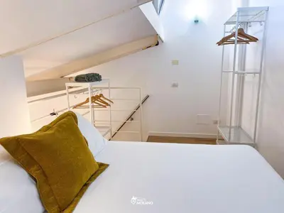 Letto o letti in una camera di CRISTAL House by Sleep in Murano