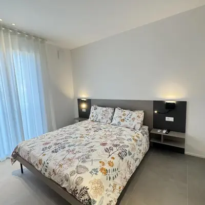 Letto o letti in una camera di A&G green flat il mare e Venezia