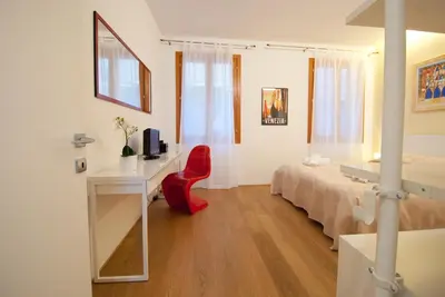 Letto o letti in una camera di Ca' Venissa
