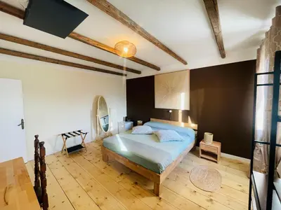 Letto o letti in una camera di Cà VENDALIS Agriturismo & Cantina