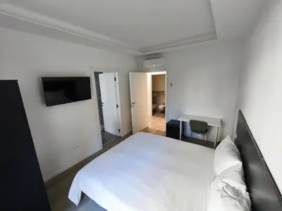 Letto o letti in una camera di Grace House
