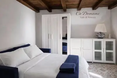 Letto o letti in una camera di Venice Lido Apartment Near Beach and Vaporetto