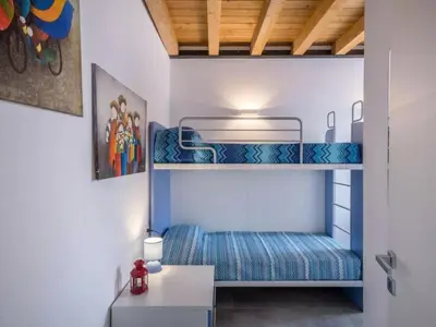 Letto o letti in una camera di Apartment Wohnung am Strand by Interhome