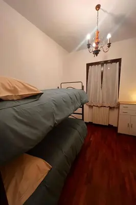 Letto o letti in una camera di Apartment 'Casa della Nonna Rooms by Interhome