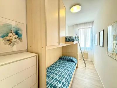 Letto o letti in una camera di Corradini 8 - Carraro Immobiliare - Family Apartments