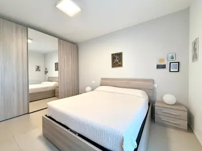 Letto o letti in una camera di Meit 5b - Carraro Immobiliare - Family Apartments