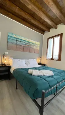 Letto o letti in una camera di Frida Apartment