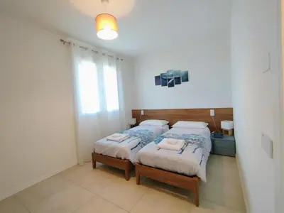 Letto o letti in una camera di Appartamento Mogano