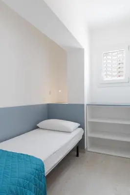 Letto o letti in una camera di Appartamenti Mirella