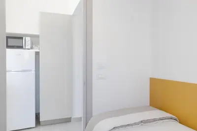 Letto o letti in una camera di Appartamenti Mirella