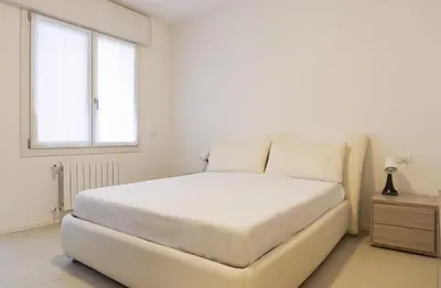 Letto o letti in una camera di Casa Orchidea