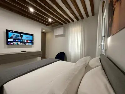 Letto o letti in una camera di Ca'Lavinia -2 Double Suites with Private Bathrooms