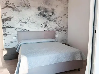 Letto o letti in una camera di Tahiti Luxury Apartments