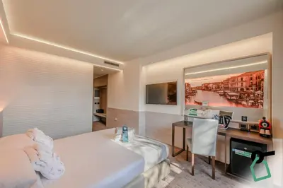 Letto o letti in una camera di Hotiday Venezia Marco Polo