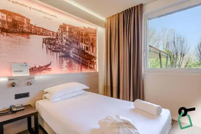 Letto o letti in una camera di Hotiday Venezia Marco Polo