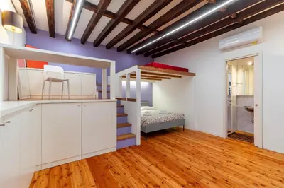 Letto o letti in una camera di Ca' Renaissance