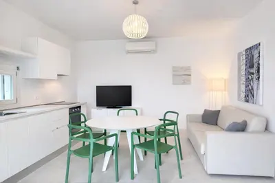 TV o dispositivi per l'intrattenimento presso Les Maisons - Carraro Immobiliare - Family Apartments