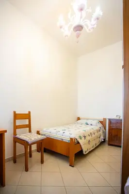 Letto o letti in una camera di Dimora Magnolia - Isola di Pellestrina VE