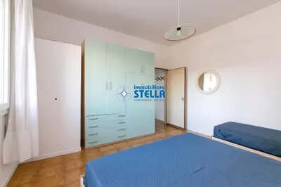 Letto o letti in una camera di Condominio Romeo