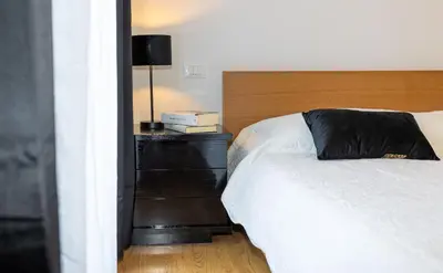 Letto o letti in una camera di Lizard Residence