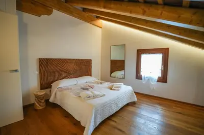 Letto o letti in una camera di Alla Rocca Storica Zefiro