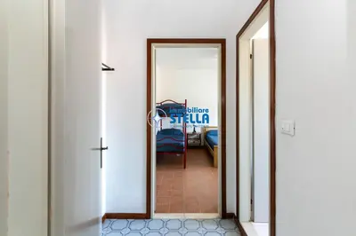 Letto o letti in una camera di Casa Romeo