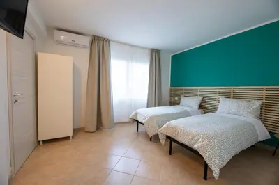 Letto o letti in una camera di CASA LETIZIA-Venice