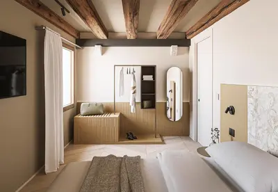 Letto o letti in una camera di Dimora Cadorin Apartments