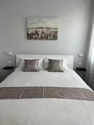Letto o letti in una camera di James Home