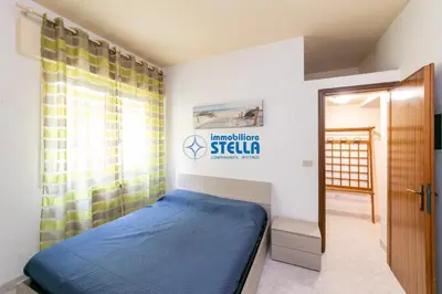 Letto o letti in una camera di Largo Augustus