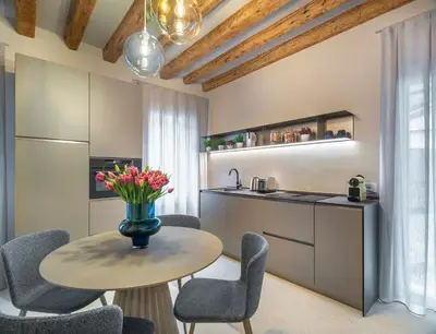 Cucina o angolo cottura di Palazzo Sarti Apartments R&R