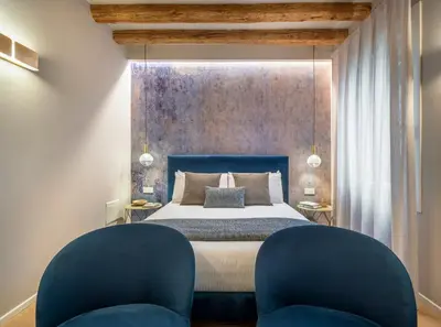 Letto o letti in una camera di Palazzo Sarti Apartments R&R