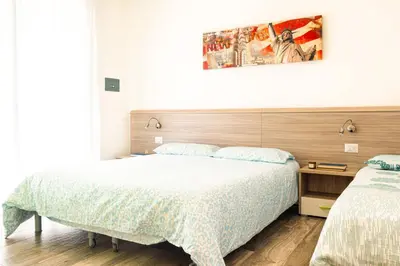 Letto o letti in una camera di Mamì Waves