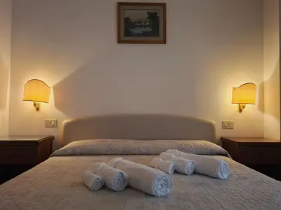 Letto o letti in una camera di Alloggi Venca'