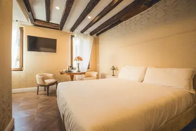 Letto o letti in una camera di Residenza Lucrezia