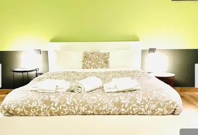 Letto o letti in una camera di Mini alloggi alle terme