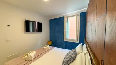 Letto o letti in una camera di Cà De La Corona EXPERIENCE