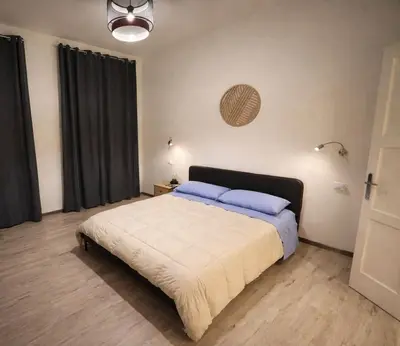 Letto o letti in una camera di La Casa dei Lumi
