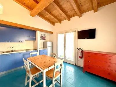 Cucina o angolo cottura di Villaggio dei Gabbiani - Carraro Immobiliare - Family Apartments