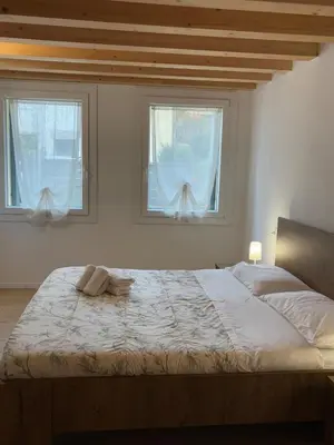 Letto o letti in una camera di Laguna Prive' - with private parking