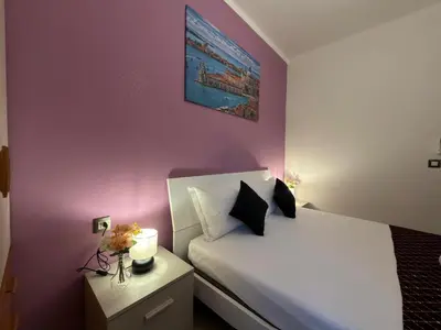 Letto o letti in una camera di CA'venezia
