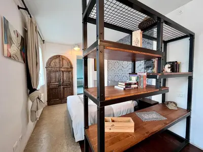 Letto o letti in una camera di Open Space Apartment at the Portello