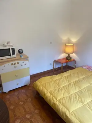 Letto o letti in una camera di Casetta