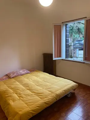 Letto o letti in una camera di Casetta