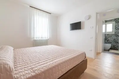 Letto o letti in una camera di Appartamento Sweet Jesolo