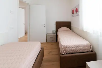 Letto o letti in una camera di Appartamento Sweet Jesolo