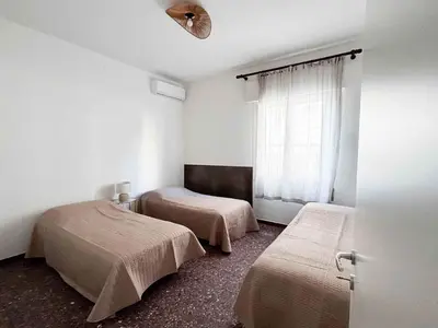 Letto o letti in una camera di Apartment Beachfront in Jesolo 54343