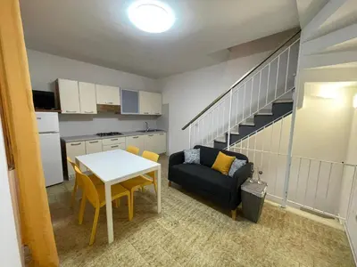Area soggiorno di Rosolina Holiday Home in the Mediterranean