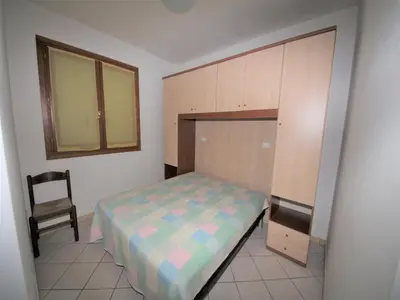Letto o letti in una camera di Apartment in Rosolina for six guests