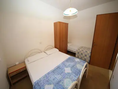 Letto o letti in una camera di Rosolina Mare Apartment Near Sea